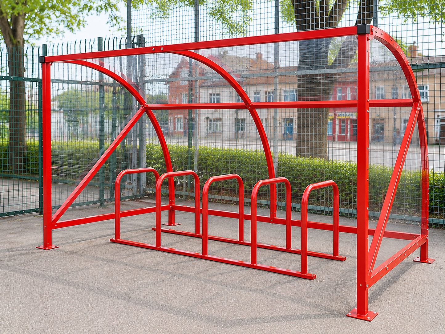 Red powder-coated 10-space curved cycle shelter with Sheffield toast rack