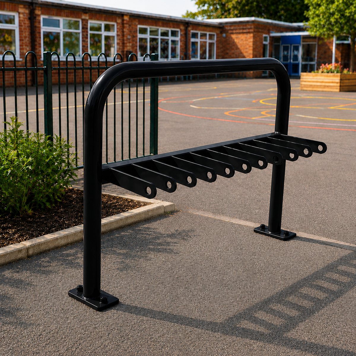 Black 10-space scooter rack installed in a school playground