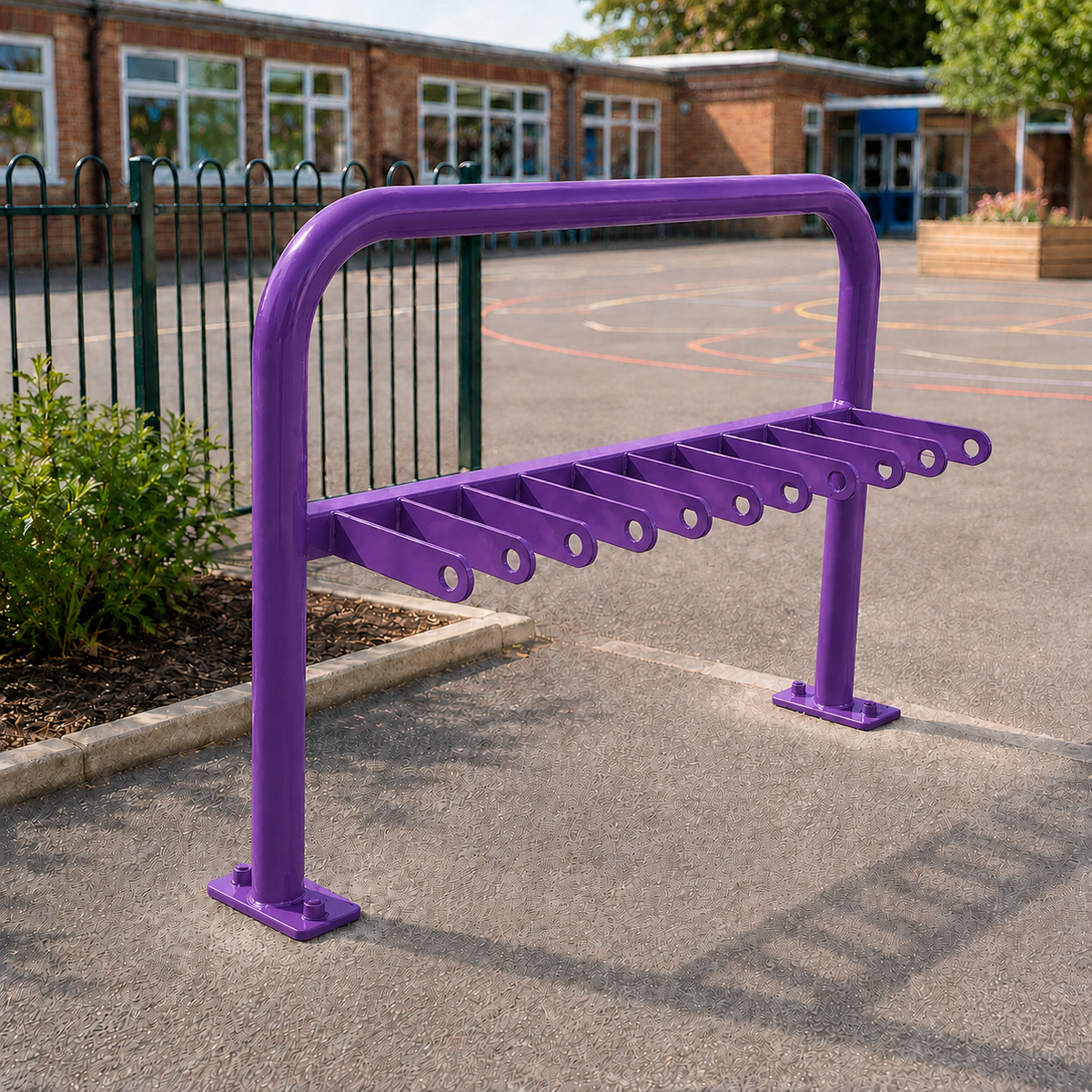 Purple 10-space scooter rack installed in a school playground
