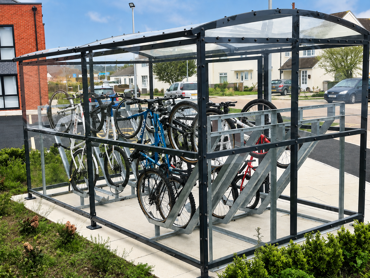 Secure carriage cycle shelter with galvanised semi-vertical racks and clear PETG panels