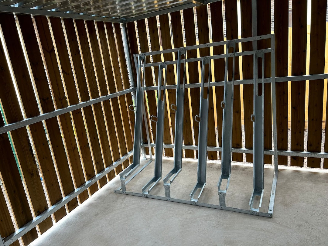 Semi‑vertical bike rack with alternating high and low bike holders for compact cycle parking