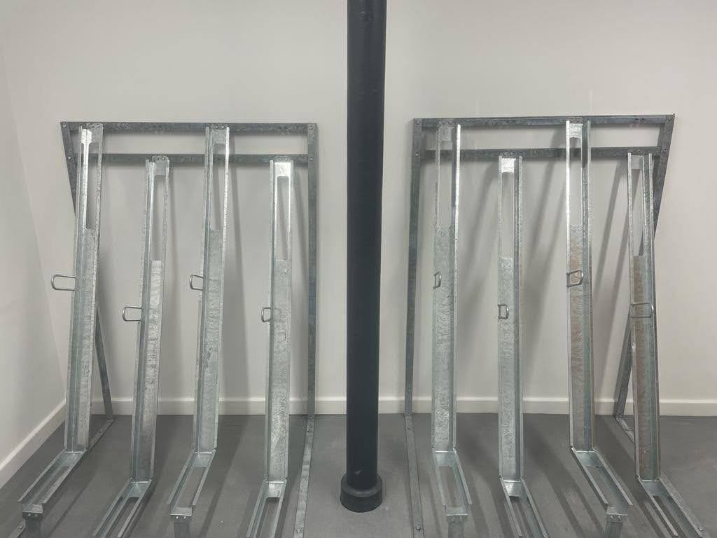 Semi‑vertical bike rack with alternating high and low bike holders for compact cycle parking