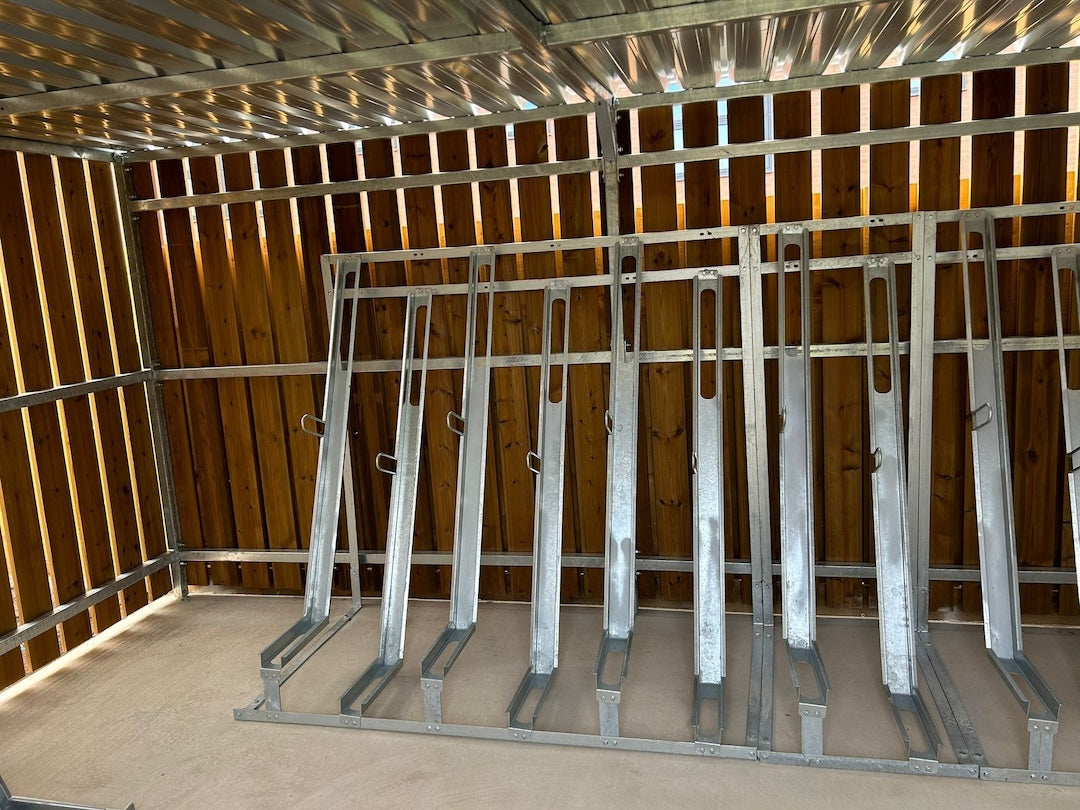 Semi‑vertical bike rack with alternating high and low bike holders for compact cycle parking