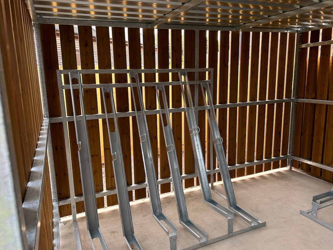 Semi‑vertical bike rack with alternating high and low bike holders for compact cycle parking