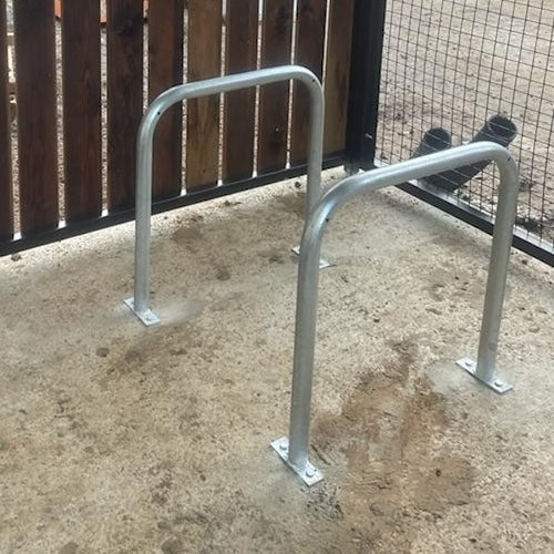 Galvanised and or Powder Coated Sheffield hoop bike rack installed on paving with two bikes locked