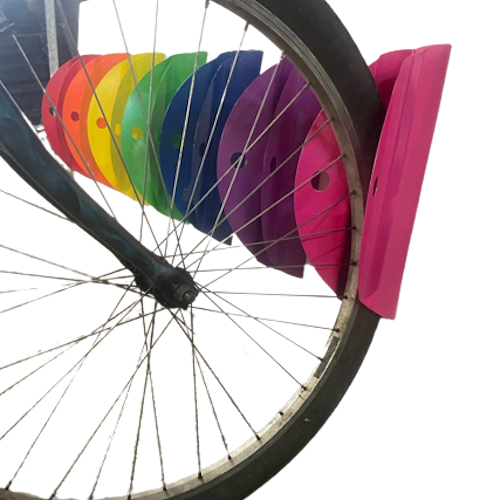 Tacco wall rack elegantly holding a bicycle against wall and floor with minimalistic design