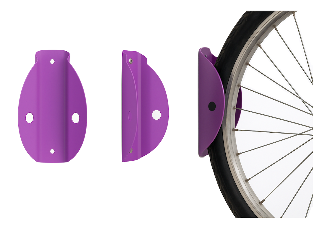 Tacco Wall Rack wall mounted bike rack holding bicycle vertically in commercial setting